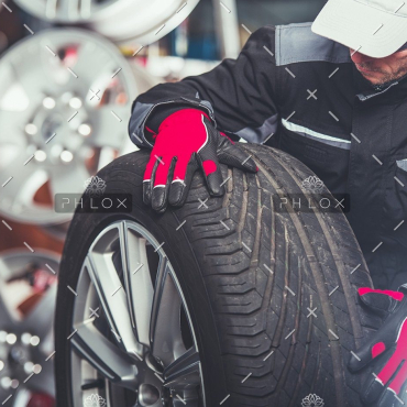 demo-attachment-241-replacing-car-tires-F6SZJYW